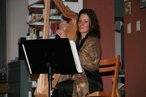 Annette Ermini played the harp at the Dedication Celebration.