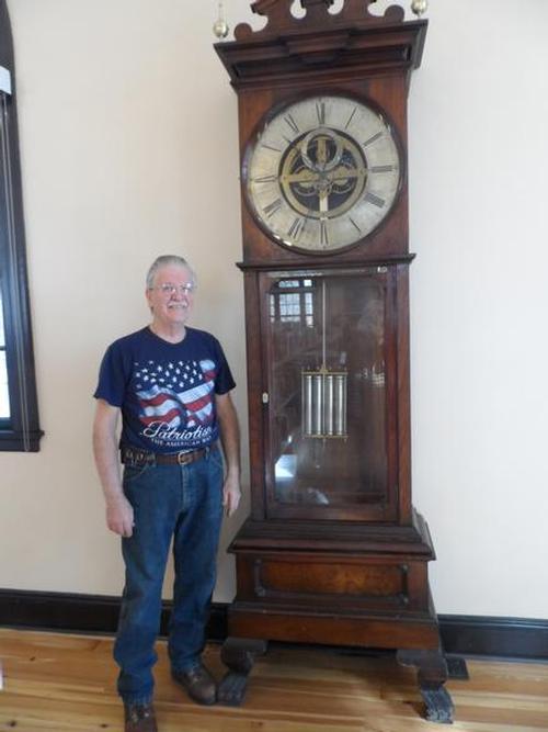 The beautiful grandfather clock at the APL has been returned to its rightful place in the restored Carnegie Library.
