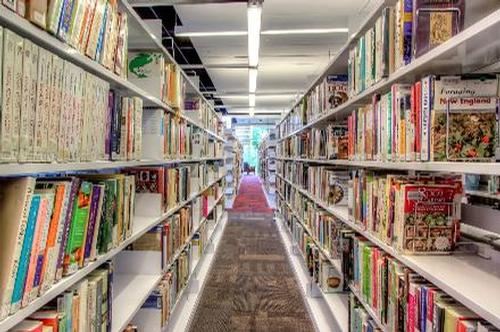 Library stacks, photo courtesy of Dennis Washburn.