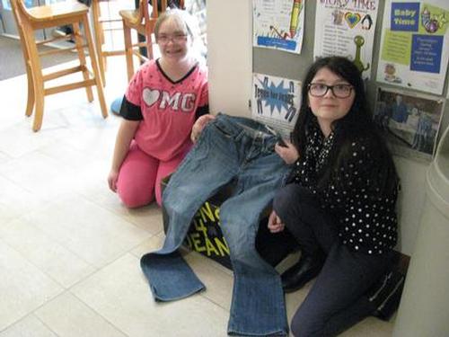 Adrianna Buzzell and Adriana Gaulzetti would like to encourage people to bring in gently used jeans for the Teens for Jeans campaign.