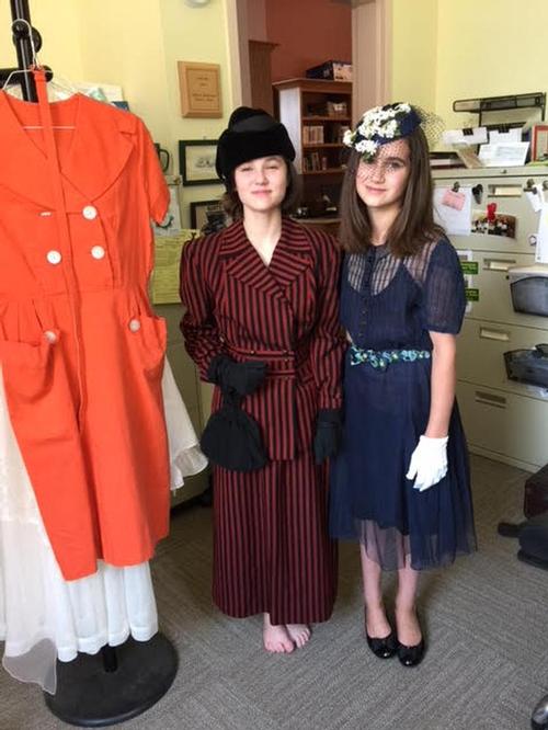Some of our nice volunteers who modeled fashion of the past 100 years for our tea attendees.