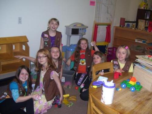 Girl Scout Troop 40218 met at the Athol Public Library to donate bookmarks and clean the toys in the Children’s Room as a community service.