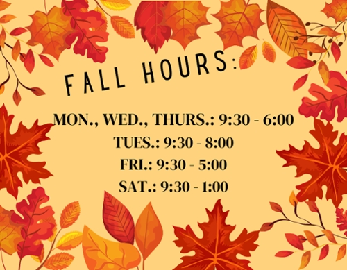Fall leaf border with the library hours in the center of the square.