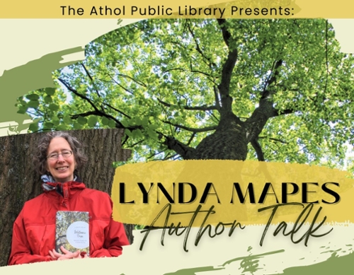Author, Lynda Mapes in a red jacket next to a tree.