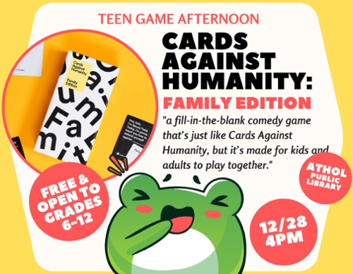 Cartoon frog laughing at he image of the Cards Against Humanity family edition.