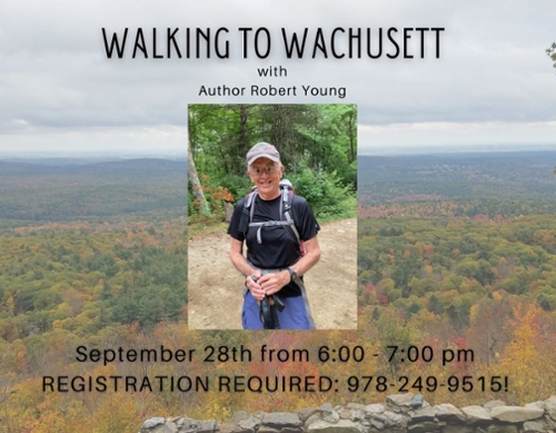 Robert Young wearing a hiking backpack.