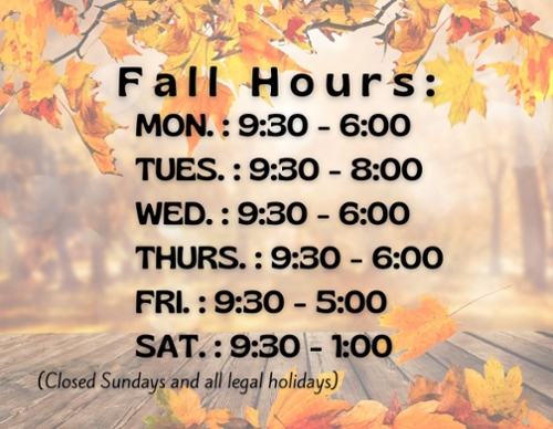 Maple tree back drop with the Fall hours listed.
